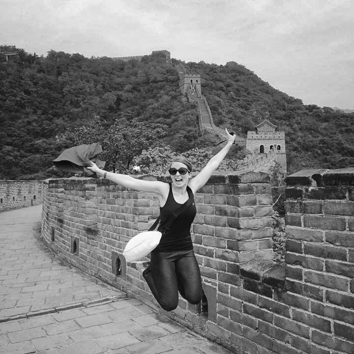 jump beijing great wall china victoria sidayoga
